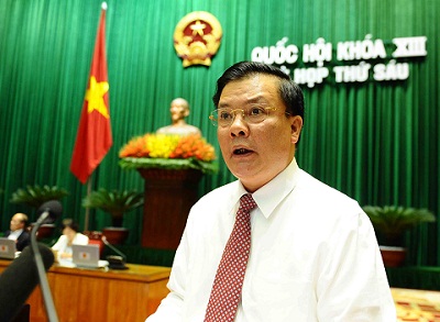 Bộ trưởng Bộ Tài chính Đinh Tiến Dũng, thừa uỷ quyền của Thủ tướng Chính phủ, trình bày Báo cáo về tình hình thực hiện dự toán ngân sách Nhà nước năm 2013; dự toán ngân sách Nhà nước và phương án phân bổ ngân sách Trung ương năm 2014