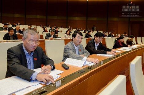 Các đại biểu Quốc hội nhấn nút thông qua Bộ luật tố tụng hình sự